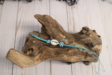 Load image into Gallery viewer, Cowrie Shell w/ Flower Tie Bracelet