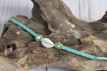 Load image into Gallery viewer, Cowrie Shell w/ Flower Tie Bracelet